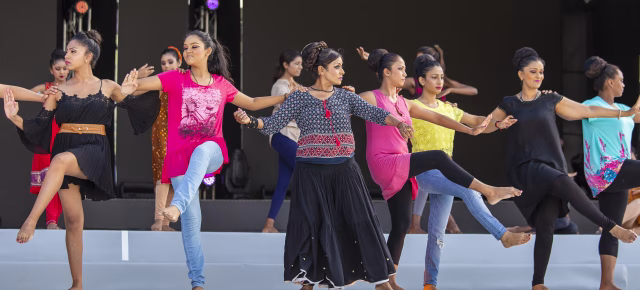 Group of adult women doing bollywood dance