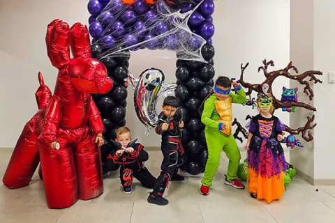 Children pose in costumes at Boonanza